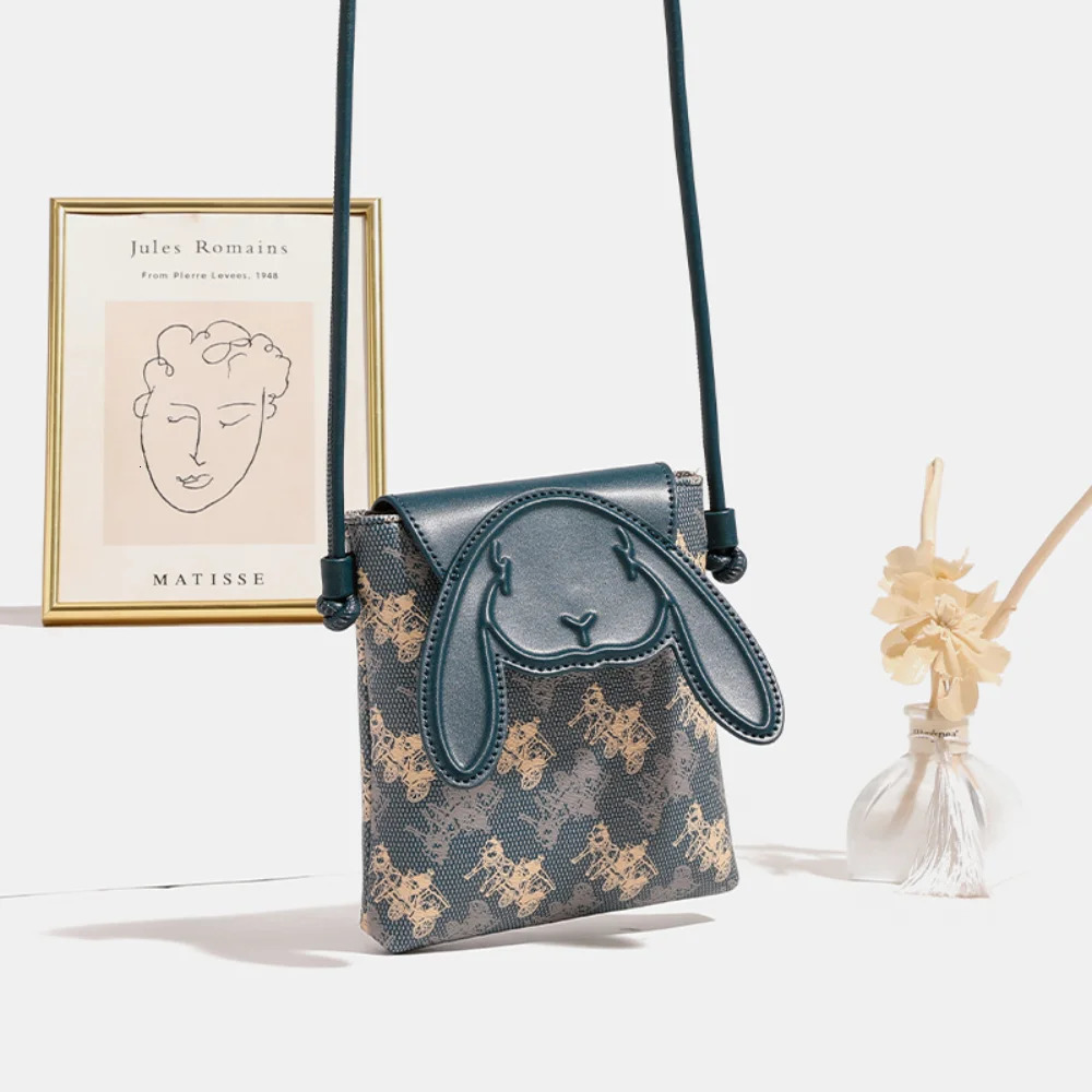Mini leather printed ten font womens bag 2025 fashion mobile phone bag womens casual shoulder bag 241213