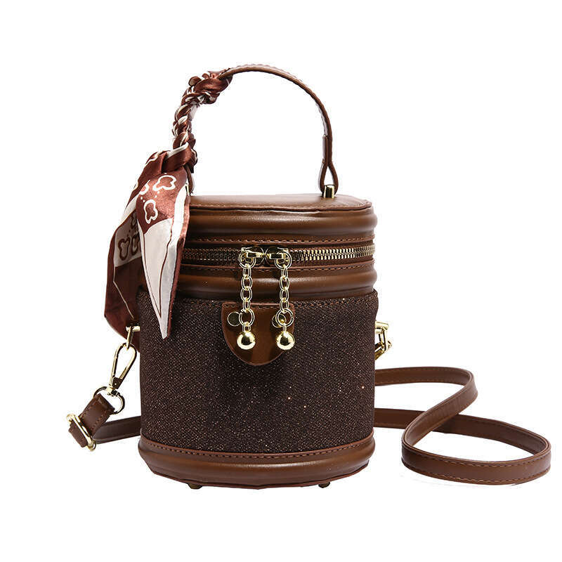 French high-end women's atmospheric cydrical handbag, niche texture commuting shoulder crossbody bag, 2024 new casual versatile fashion clothing