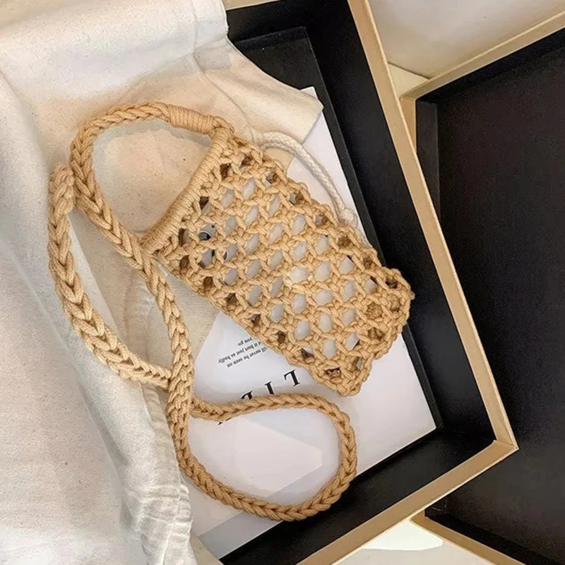 Womens fashionable small cross shaped mobile phone bag solid color hollow womens crochet lightweight woven shoulder bag 241213