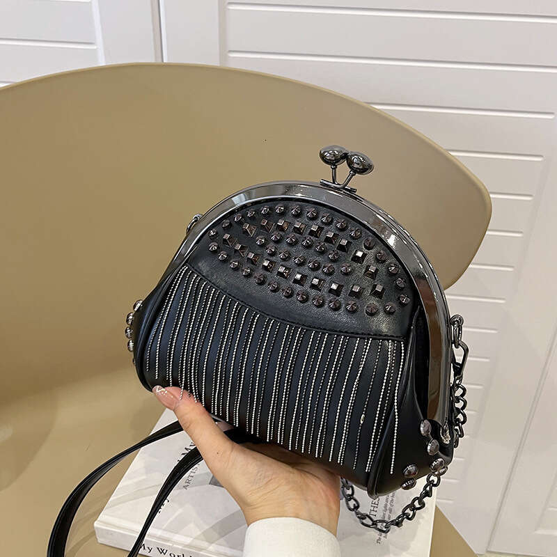 Popular women's high-end feeg, rivet tassel chain, one shoulder crossbody versatile, armpit clip, shell bag, 2024 new casual fashion trend clothi
