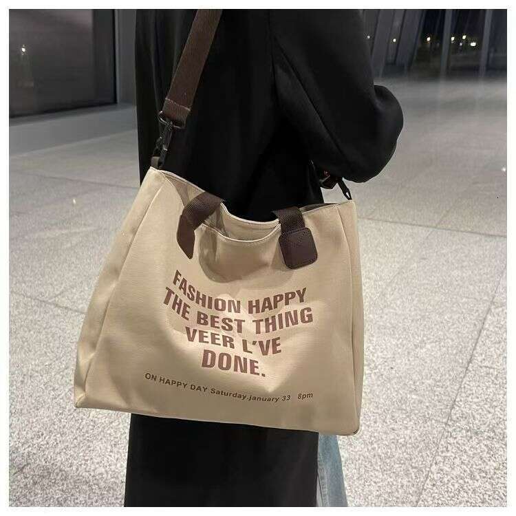 Canvas for women 2024 new letter tote Korean version fashionable versatile crossbody shoulder bag student backpack