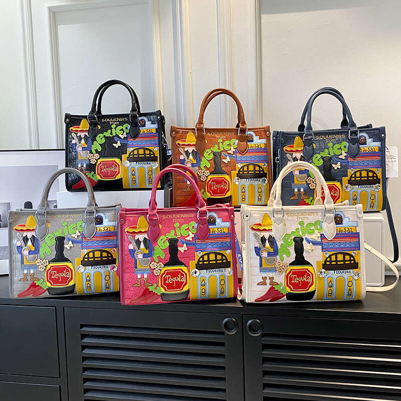 Large capacity handbag with female niche design, Mexican style adhesive fabric embroidery graffiti single shoulder crossbody bag, 2024 new casual vers
