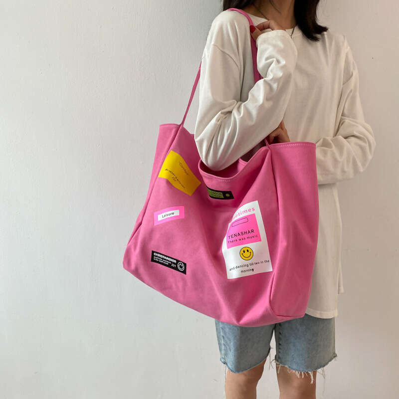 Japanese and Korean large capacity canvas commuting shoulder for women, 23 styles, niche Instagram style adhesive fabric armpit tote bag wholesale, 20