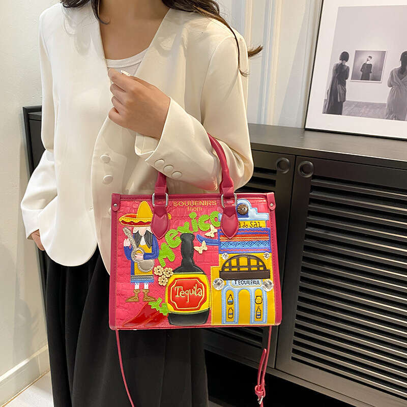 Large capacity handbag with female niche design, Mexican style adhesive fabric embroidery graffiti single shoulder crossbody bag, 2024 new casual vers