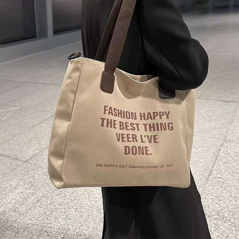 Canvas for women 2024 new letter tote Korean version fashionable versatile crossbody shoulder bag student backpack