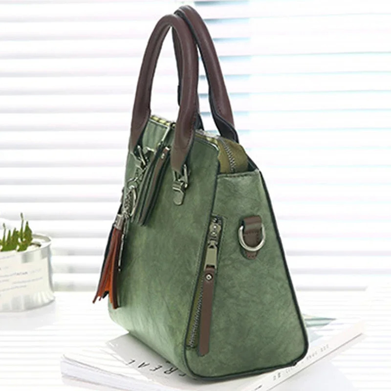 Retro womens PU leather handbag womens messenger bag Tassel er cross body shoulder bag Boston handbag 241212
