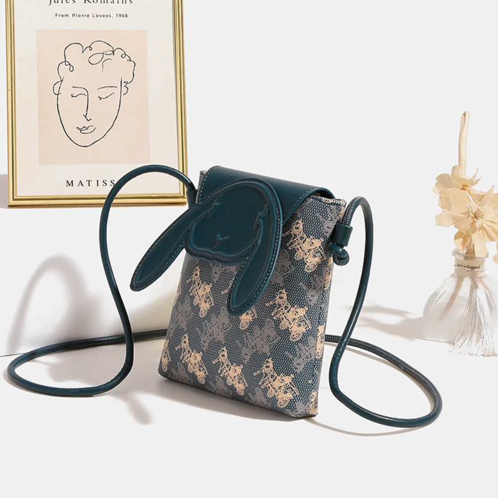 Mini leather printed ten font womens bag 2025 fashion mobile phone bag womens casual shoulder bag 241213