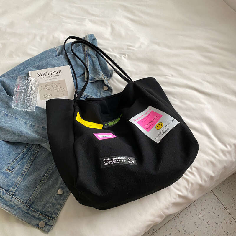 Japanese and Korean large capacity canvas commuting shoulder for women, 23 styles, niche Instagram style adhesive fabric armpit tote bag wholesale, 20