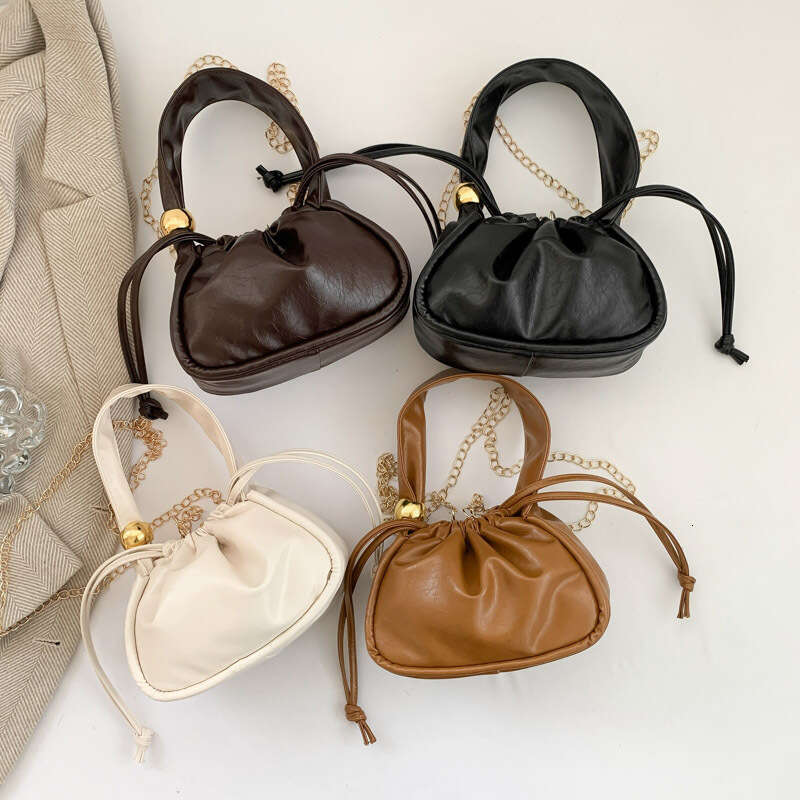 French style trendy handbag for women 2024, high-quality hand-held water bucket, lucky spicy girl niche single shoulder crossbody bag, 2024 new casual