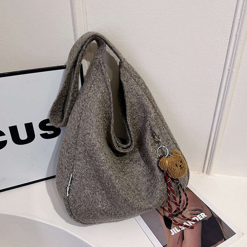 2024 autumn and winter new large capacity woolen crossbody women's versatile solid color shoulder bag, niche tote bag