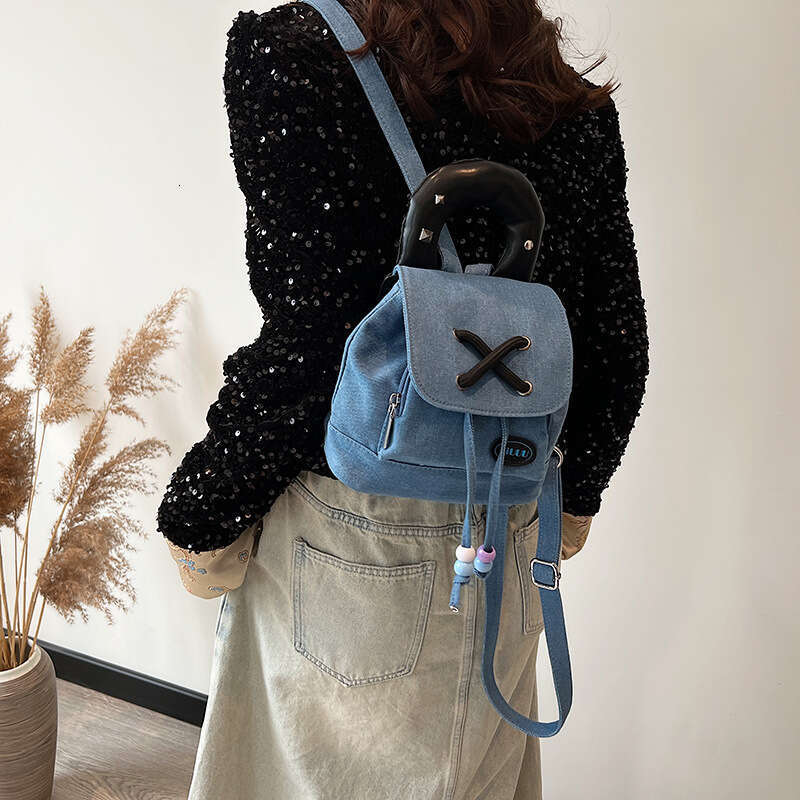 Spicy girl style denim commuting internet celebrity bucket backpack, large capacity shoulder bag, 2024 new casual versatile fashion clothing