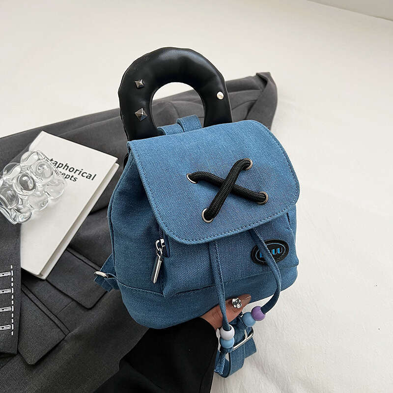 Spicy girl style denim commuting internet celebrity bucket backpack, large capacity shoulder bag, 2024 new casual versatile fashion clothing