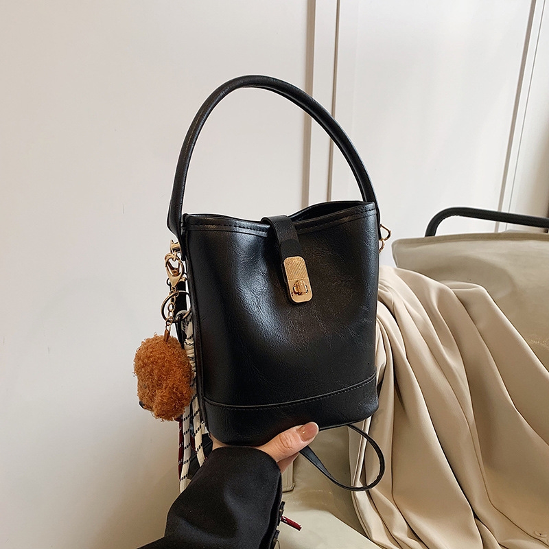 Designer 2025 new style free shipping designer Bucket handbag black Brown Beige pendant Bags for womens'daily leisure bags