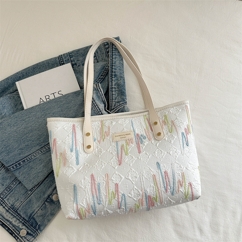 Free shipping designer bags for womens Embroidered tote bag black white blue pink Fashionable and versatile With hanging decorations