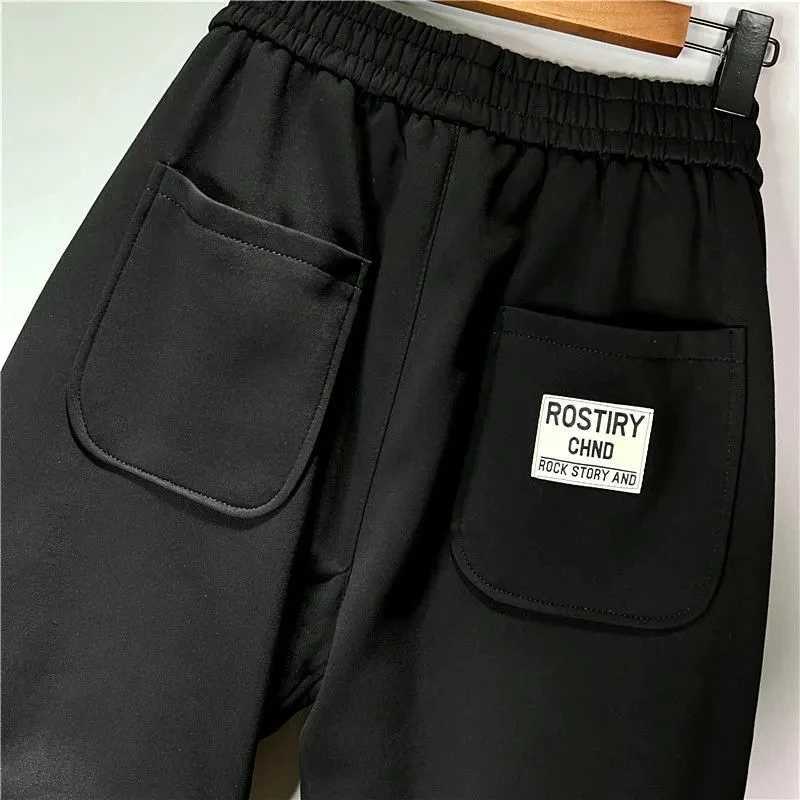 Korean bag pants mens spring and summer new sports pants personalized sports letter casual pants elastic fully matched Pantalones Hombre X241216