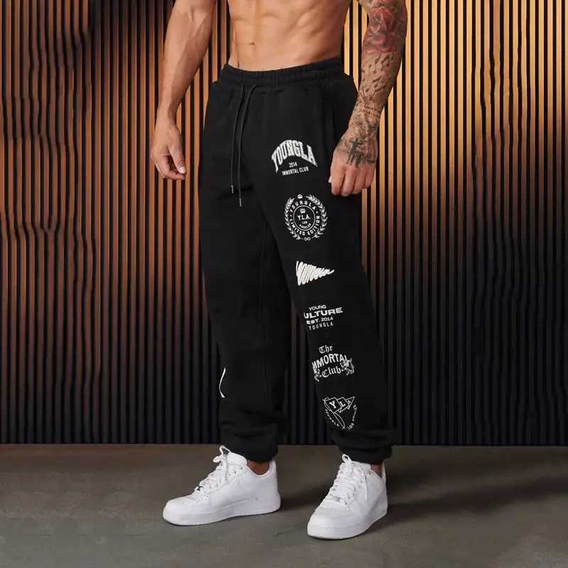 American style YA mens sports pants spring and autumn jogging fitness center cotton printed casual pants mid waist drawstring pants X241216