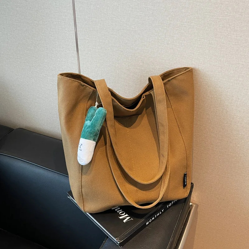 New Canvas Women leisure s Large Capacity Fashionable Multi functional Simple Shoulder trend Texture Commuter Designer Handbag Trendy Shoulder Bag