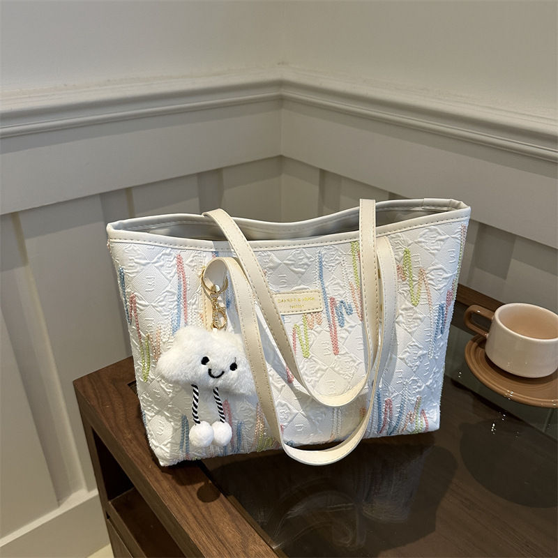 Free shipping designer bags for womens Embroidered tote bag black white blue pink Fashionable and versatile With hanging decorations