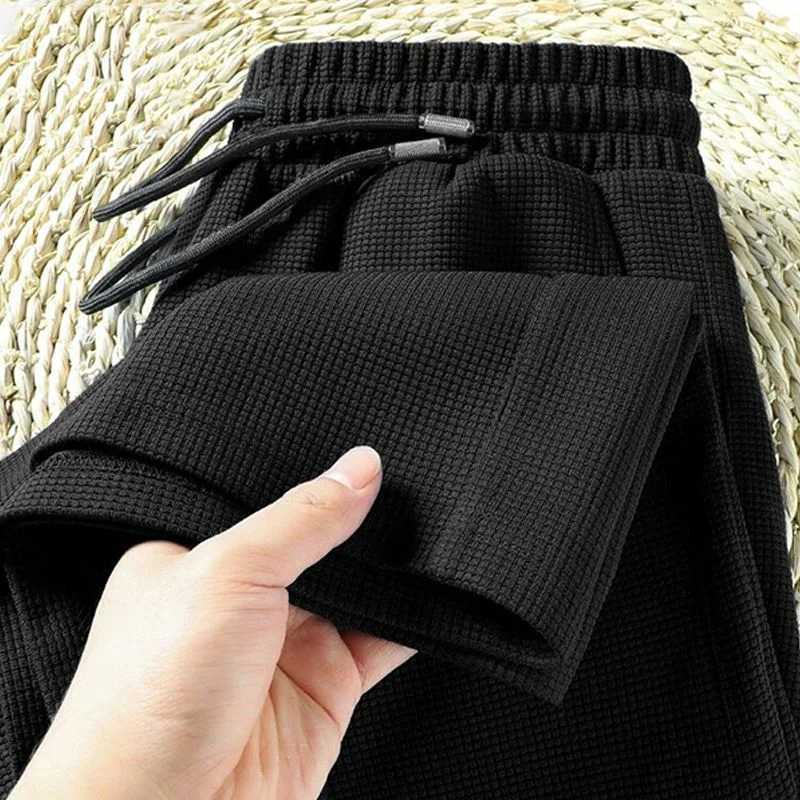 High Quality Autumn New Straight Waffle Pants Mens Elastic Waist Drawstring Print Plaid Pockets Korean Loose Sports Casual Trousers T241217