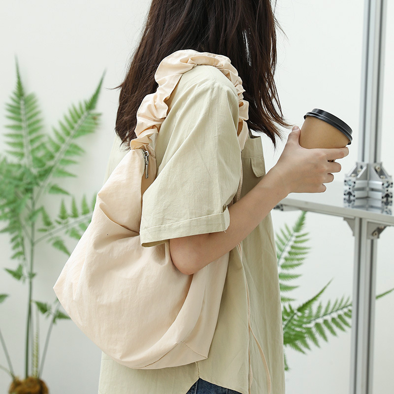 Casual drawstring handbag ins small fresh pleated single shoulder women's internet famous fashionable nylon fabric crossbody bag