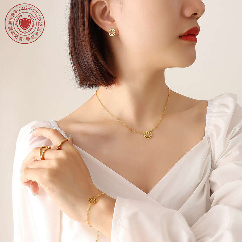 China-Chic Facial Bag Versatile Smiley Face Hollow out Pendant Necklace Bracelet Earring Set Gold Plated Jewelry