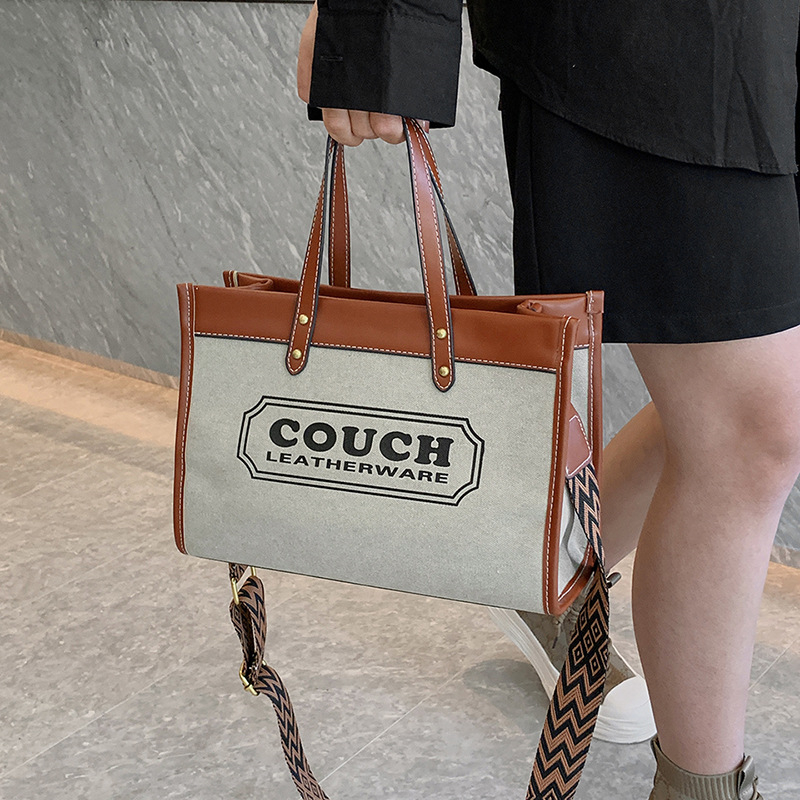 free shipping Handheld tote bag with new canvas contrasting printed letters for commuting single shoulder crossbody bag
