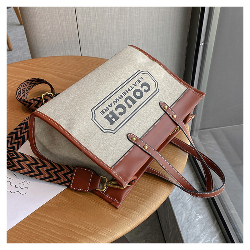 free shipping Handheld tote bag with new canvas contrasting printed letters for commuting single shoulder crossbody bag
