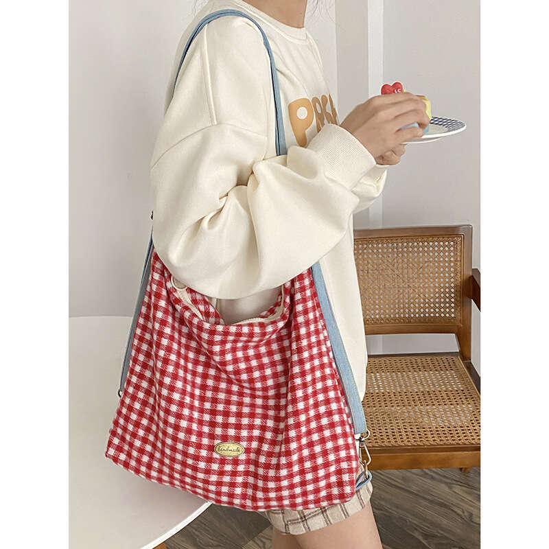 Design a red checkered multifunctional single shoulder for women, versatile and large capacity backpack, adjustable crossbody bag