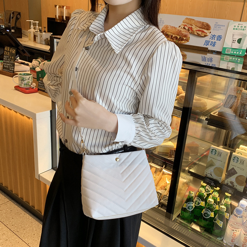 New Embroidery Bucket Leather Bag Fashion Designer Multi functional Personalized Women s Shoulder Bag Trendy Crossbody Bag bag