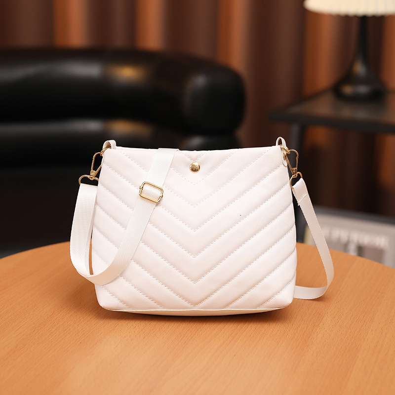 New Embroidery Bucket Leather Bag Fashion Designer Multi functional Personalized Women s Shoulder Bag Trendy Crossbody Bag bag