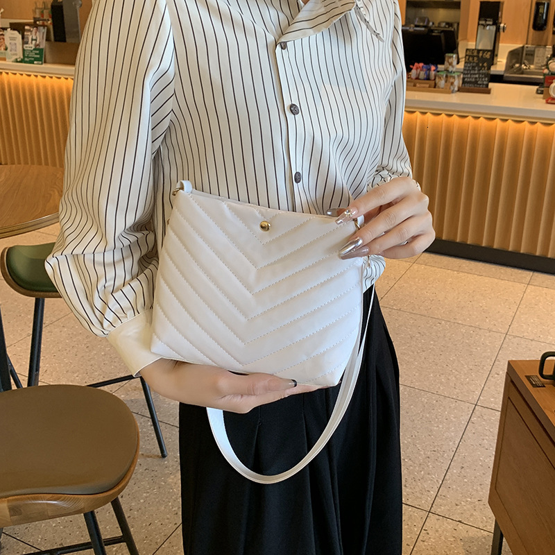 New Embroidery Bucket Leather Bag Fashion Designer Multi functional Personalized Women s Shoulder Bag Trendy Crossbody Bag bag