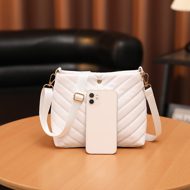 New Embroidery Bucket Leather Bag Fashion Designer Multi functional Personalized Women s Shoulder Bag Trendy Crossbody Bag bag