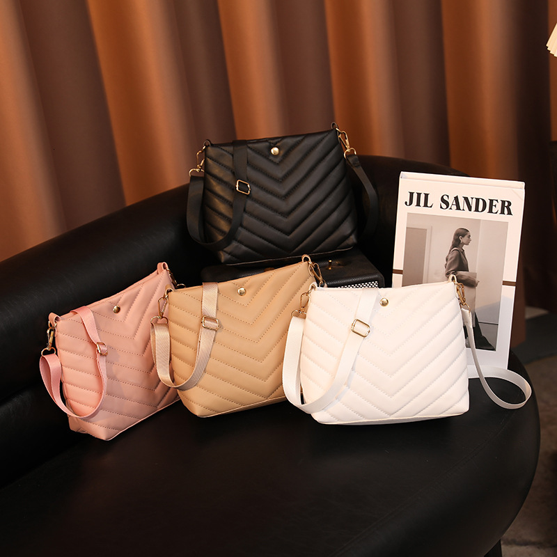 New Embroidery Bucket Leather Bag Fashion Designer Multi functional Personalized Women s Shoulder Bag Trendy Crossbody Bag bag
