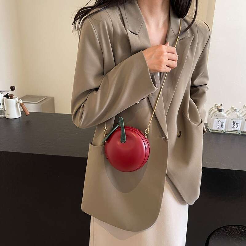 Summer fresh and cute Apple ladies' small round 2024 new niche chain mini solid color crossbody bag trend