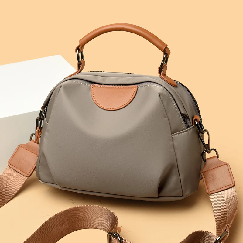 New High end Nylon Fabric Designer Women s Handheld Cross body Lightweight Large Capacity Leisure Multi functional Shoulder Bag bag