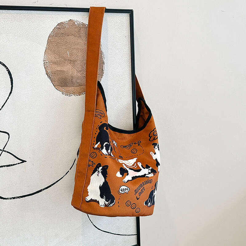 Single shoulder bucket women's French style high beauty cute little dog print bag, large capacity casual canvas bag