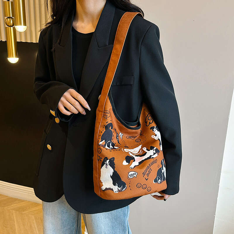 Single shoulder bucket women's French style high beauty cute little dog print bag, large capacity casual canvas bag