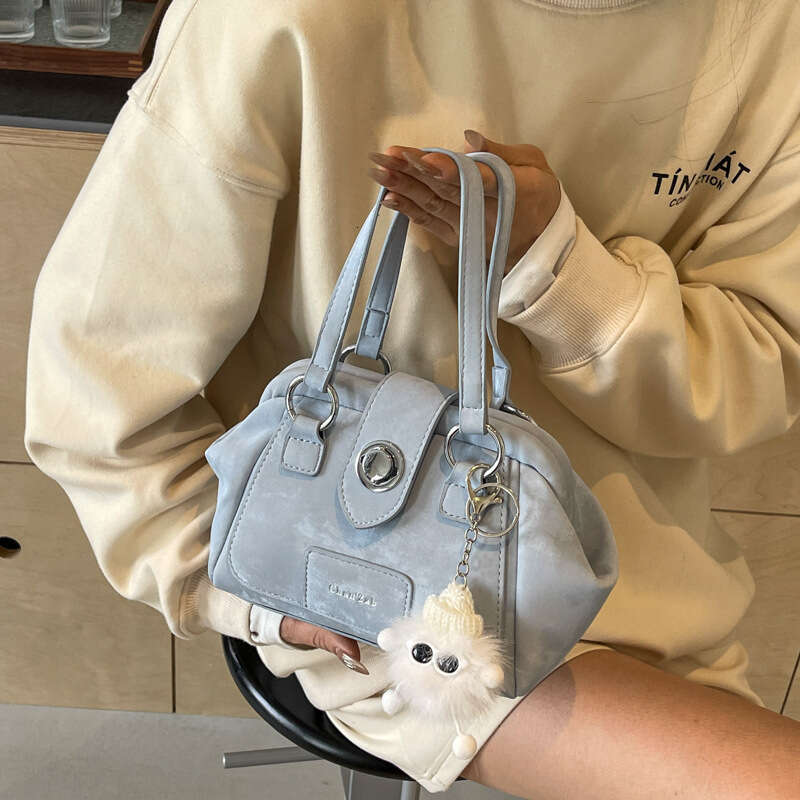 Small niche design shoulder solid color crossbody bag, women's spring new fashion handbag, texture