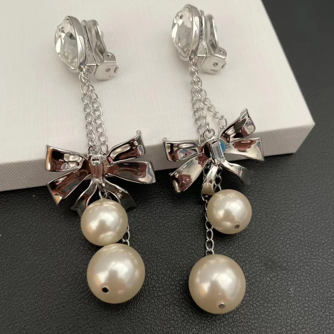 Small fringe long earrings butterfly pearl crystal Europe and the United States exaggerated wind ear clip 241220
