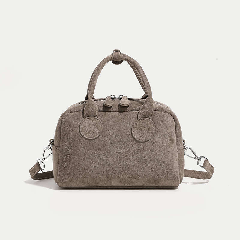 Matte hand-held bowling for women 2024 new niche pillow bag, simple and versatile single shoulder crossbody bag