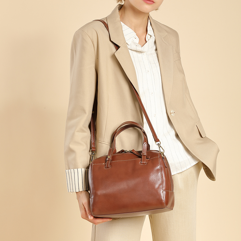 New cowhide Boston leather women s handbag trend designer pillow handbag women s shoulder width crossbody bag bag