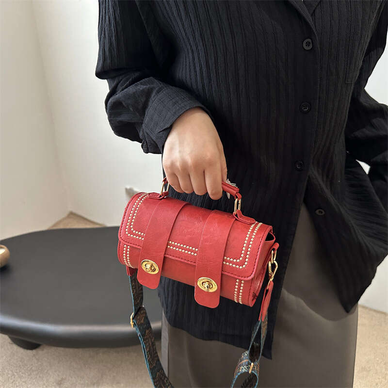 Niche handbag for women 2024 new versatile crossbody bag, trendy and trendy, hand-held Boston cylindrical bag
