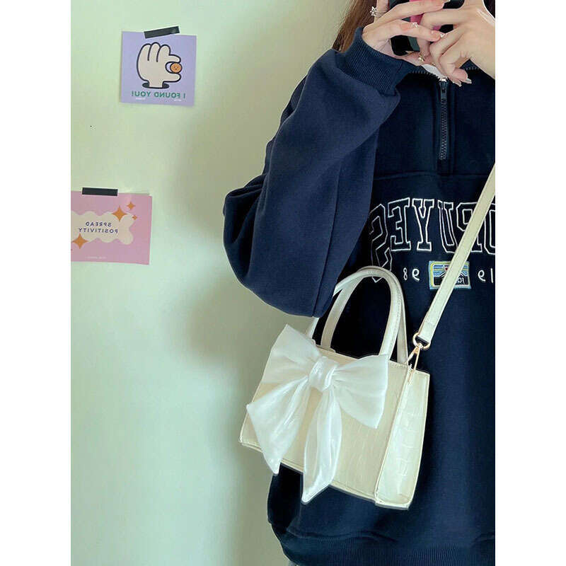 Bow commuting handbag 2024 new fashionable and high-quality small square bag, sweet girl single shoulder diagonal cross bag