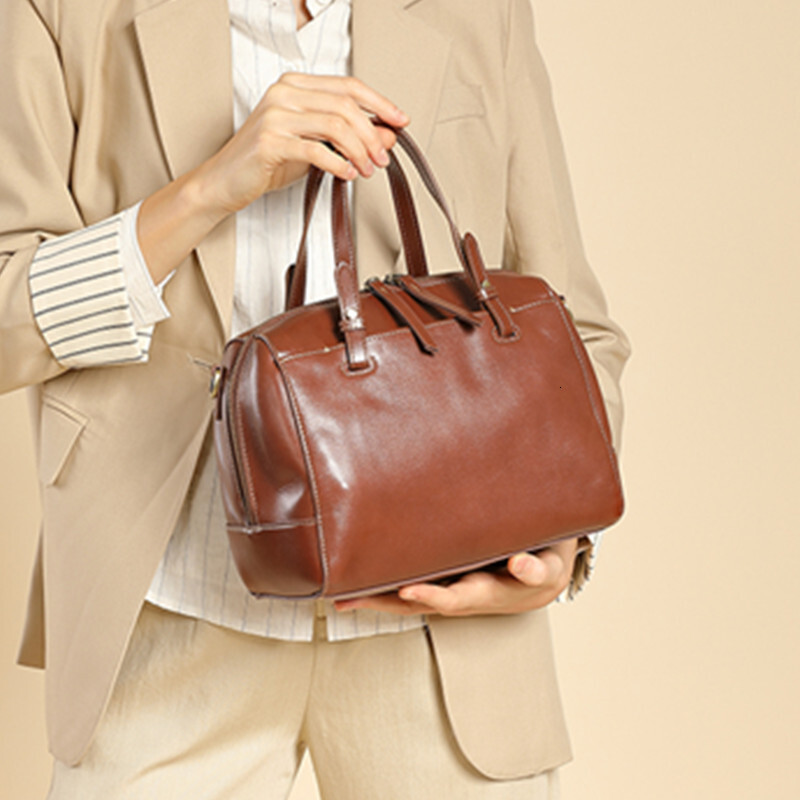 New cowhide Boston leather women s handbag trend designer pillow handbag women s shoulder width crossbody bag bag
