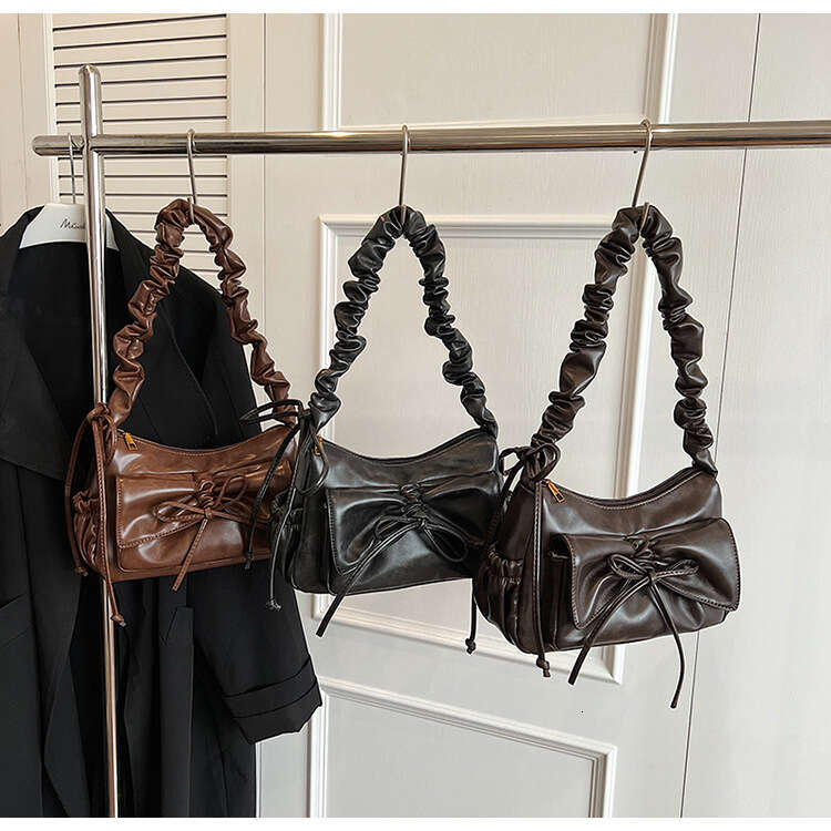Wrinkled cloud shoulder women's fashionable bow, niche, sweet dinner bag, high-end crossbody bag
