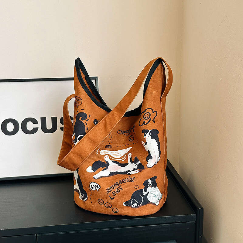 Single shoulder bucket women's French style high beauty cute little dog print bag, large capacity casual canvas bag