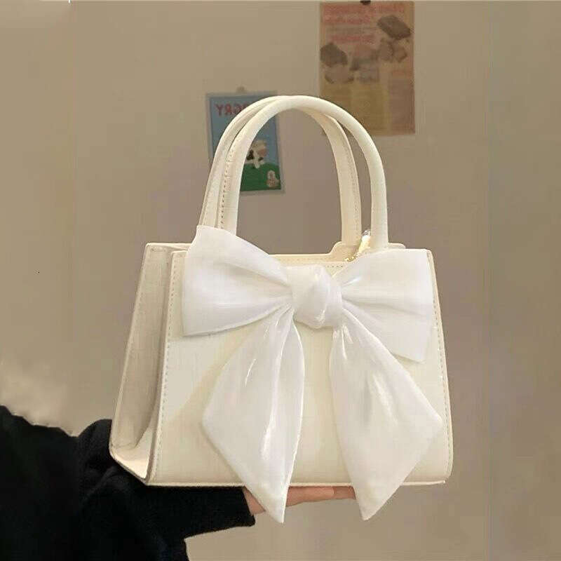 Bow commuting handbag 2024 new fashionable and high-quality small square bag, sweet girl single shoulder diagonal cross bag