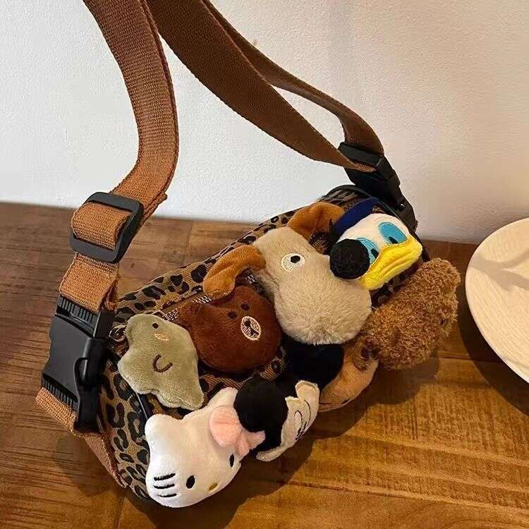 Luxury niche leopard print women in autumn and winter 2024, new crossbody bucket for women's leisure cylindrical bag