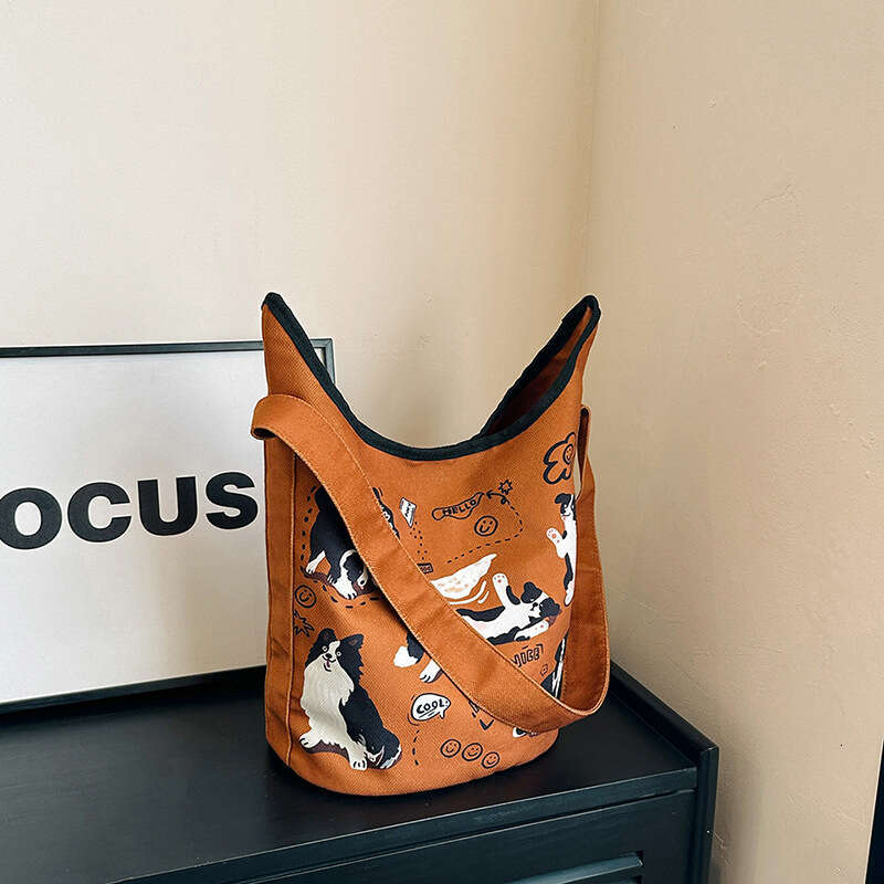 Single shoulder bucket women's French style high beauty cute little dog print bag, large capacity casual canvas bag