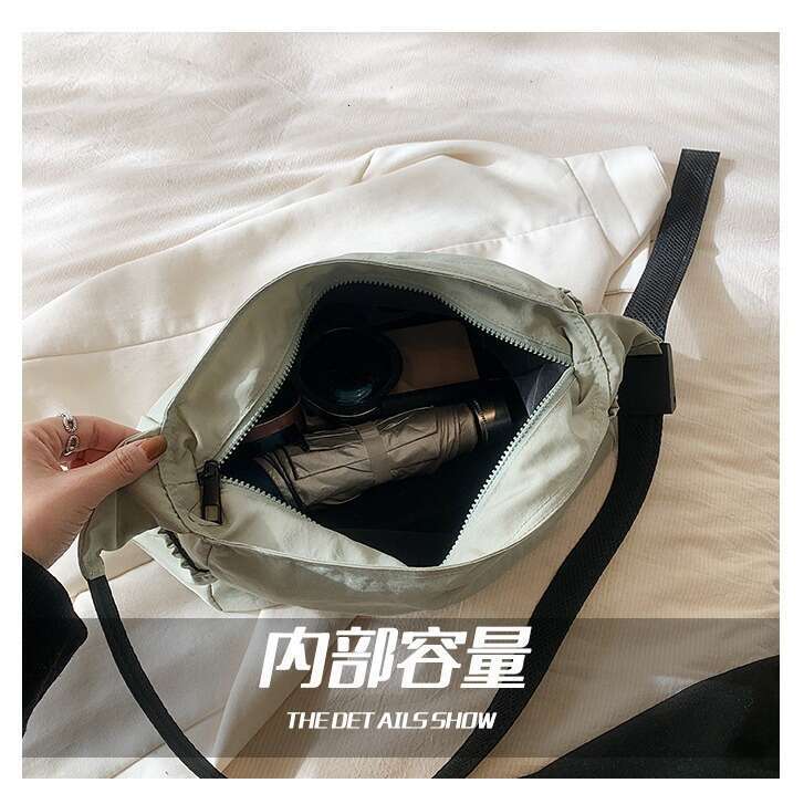 Oxford cloth large capacity women's lazy style, one shoulder diagonal cross bag, 2024 new fashionable and casual canvas trend
